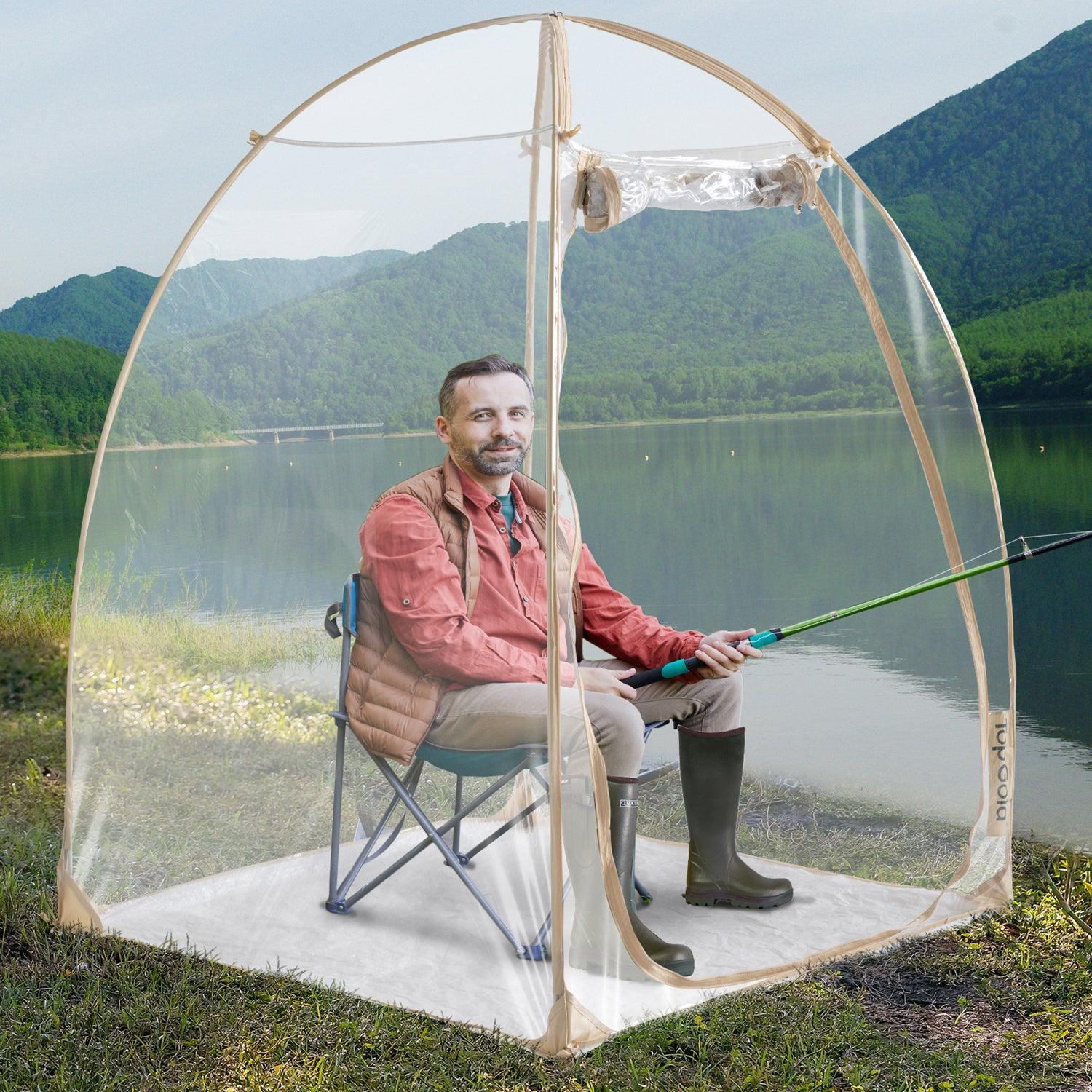 A man fishing under the weather pods